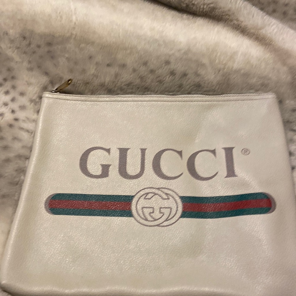Authentic GUCCI pouch bag.  Barely used, extremely clean.